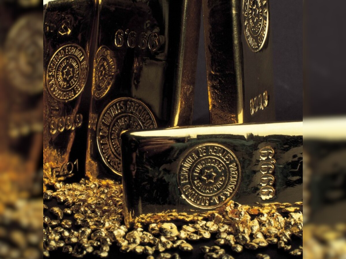 Gold rebounds on low-level buying, global cues