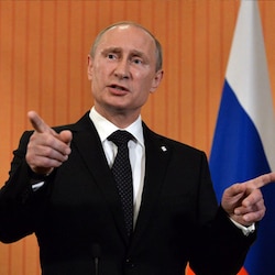 Italy gives Vladimir Putin stage to make case against sanctions