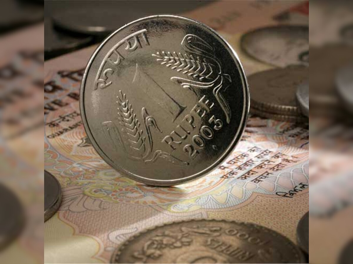 Rupee bounces back, firms up 10 paise against dollar