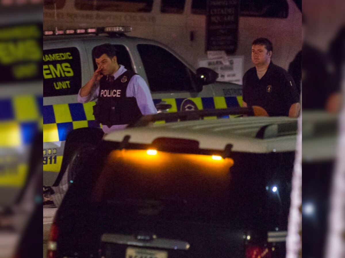 Gunman at large after killing 9 at historic African-American Charleston church