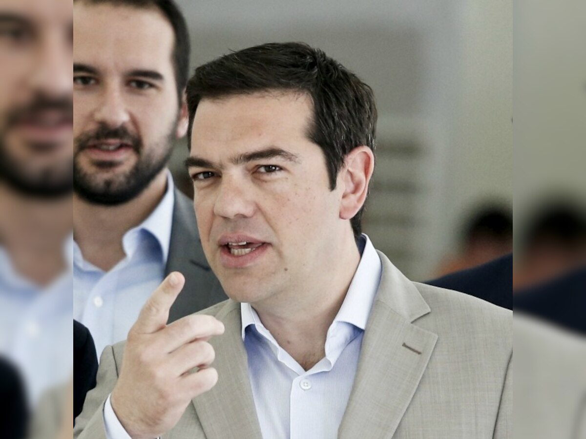Greek PM Tsipras sees solution to debt crisis and return to growth