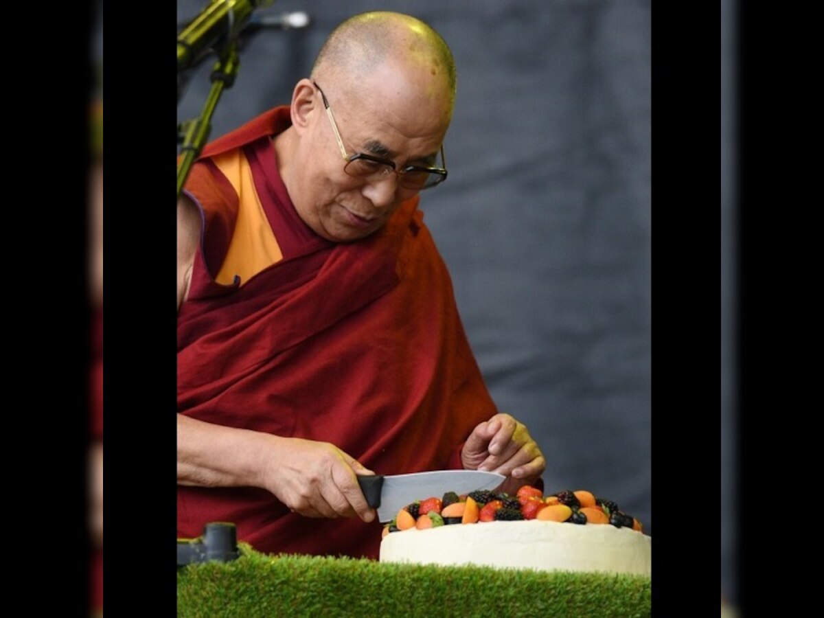 Dalai Lama cuts 80th birthday cake on Glastonbury stage