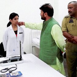 Jammu and Kashmir: BJP Minister Chaudhary Lal Singh touches woman doctor's collar, image goes viral