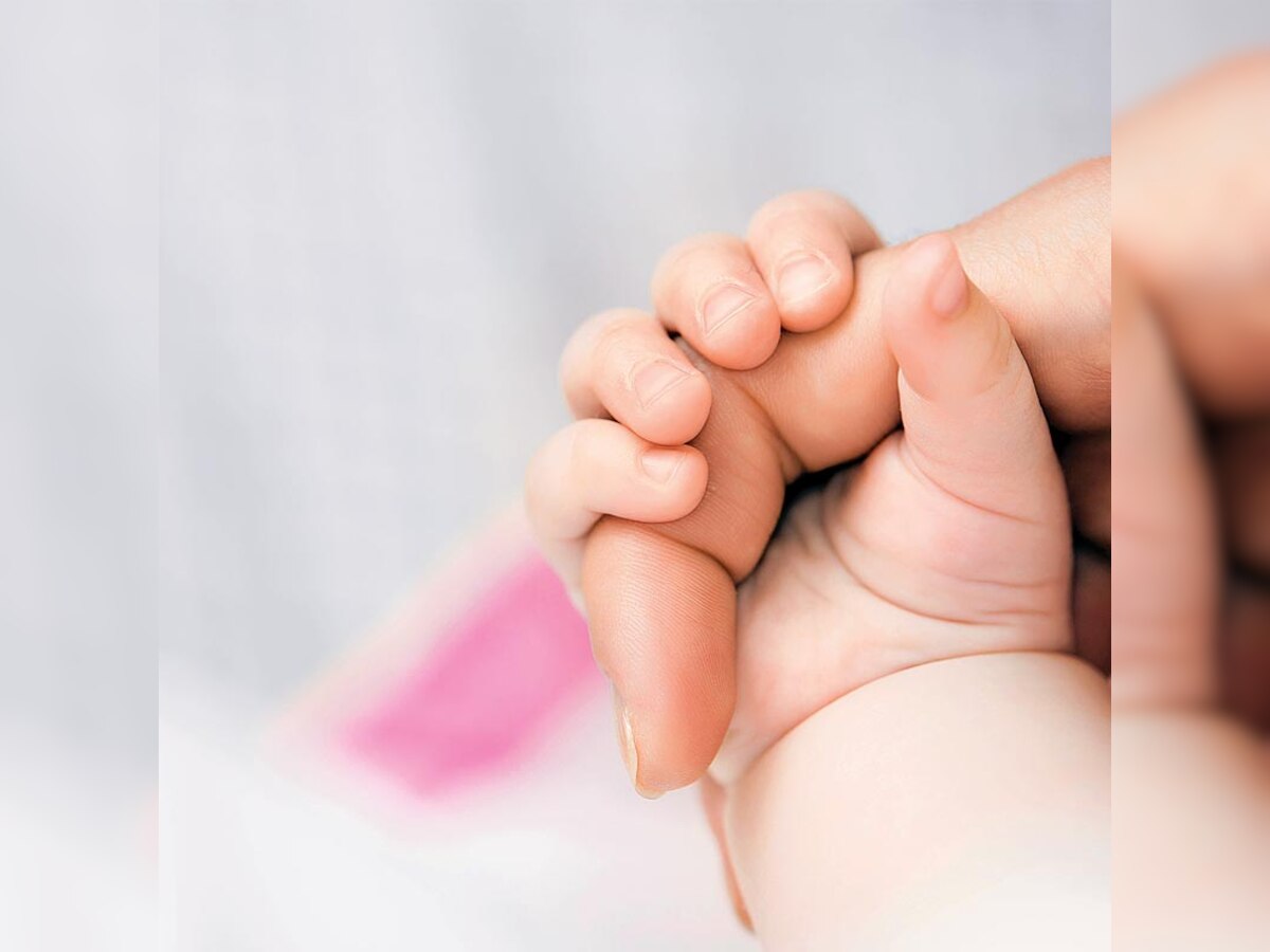 Three month old deaf baby hears after cochlear implant surgery