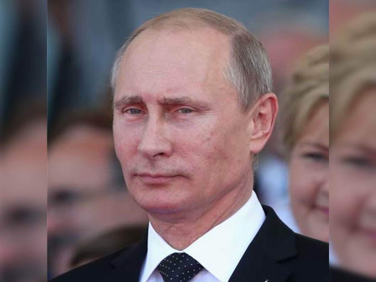 Russia's Vladimir Putin calls Elton John, for real this time, offers meeting