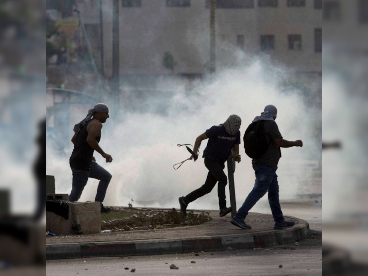 Behind surge in Palestinian-Israeli attacks, angry youth and women