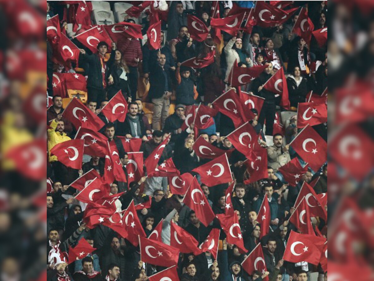 Turkish football fans boo, chant 'God is Great' during one-minute silence for Paris attack victims