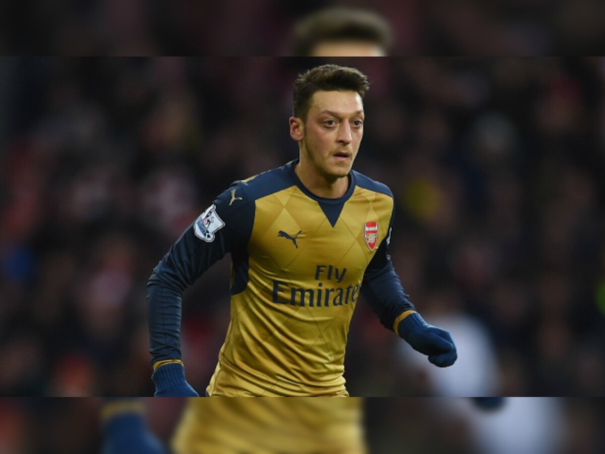 Arsenal's defence not afraid of Barcelona trio, says Ozil