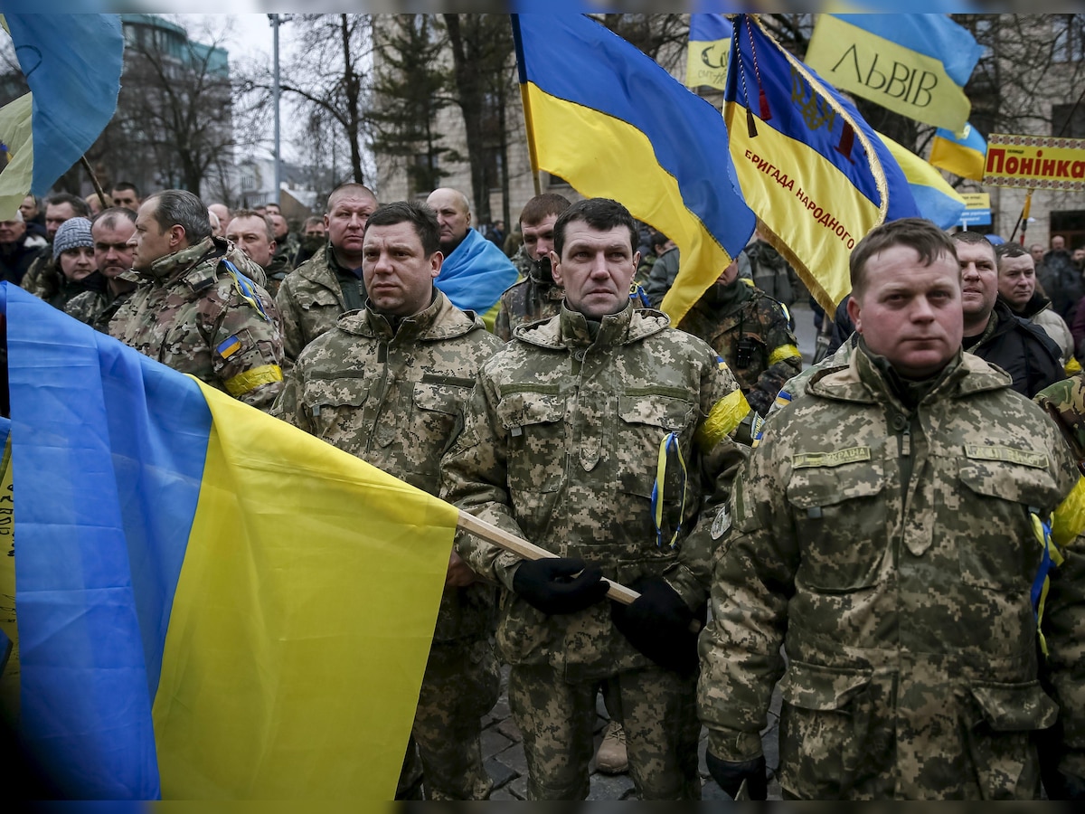 Ukrainians mark protest anniversary amid political crisis