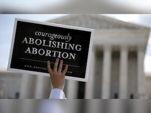 Texas abortion case goes before shorthanded US Supreme Court