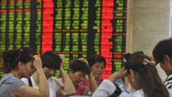 Chinese, Hong Kong stocks down as investors turn cautious