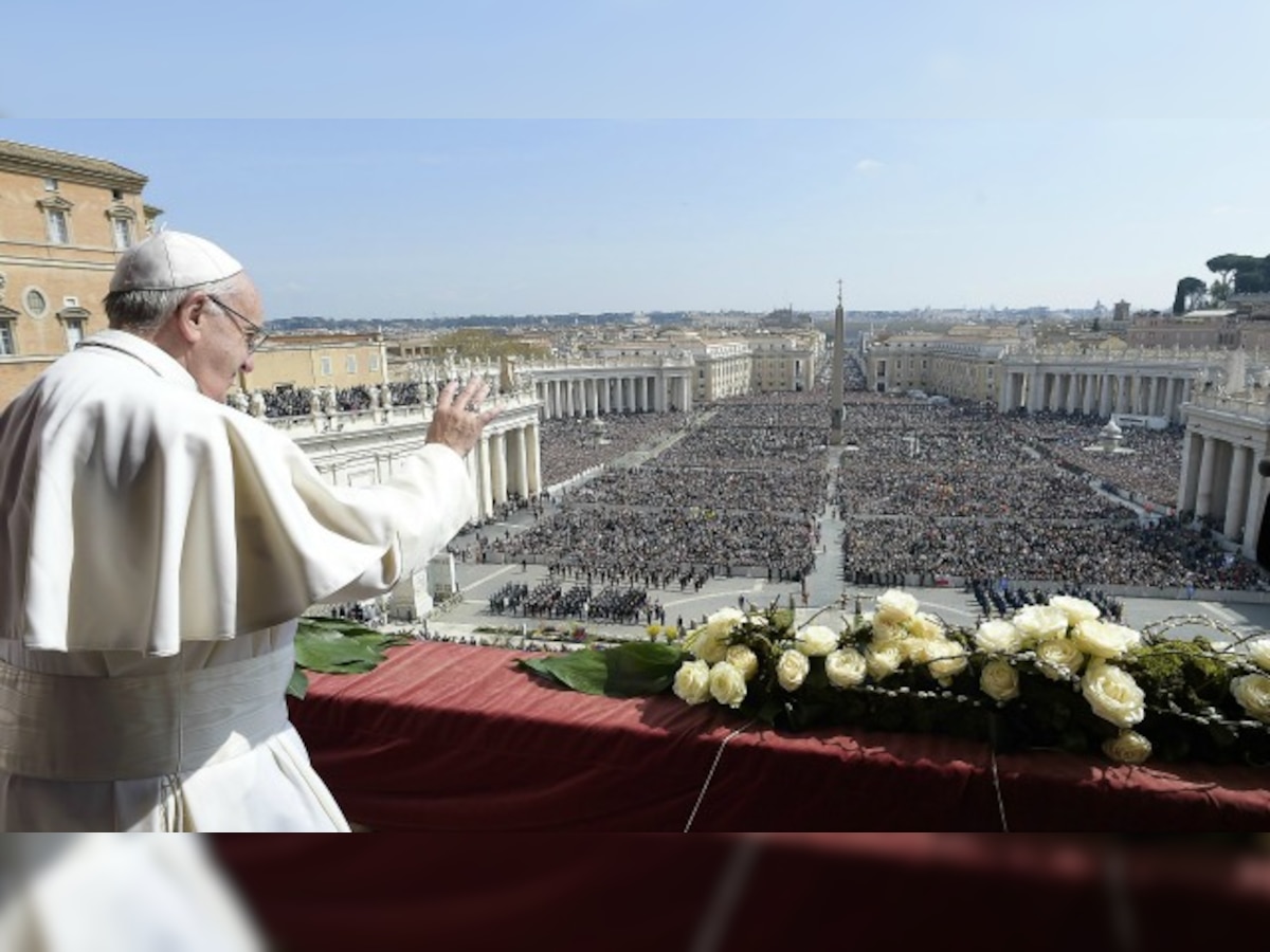 Pope Francis celebrates outdoor Easter Mass; Vatican security tight