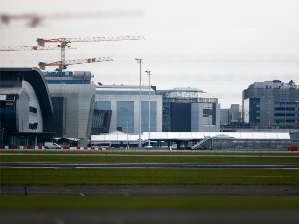 Brussels Airport reopens with three flights, tighter security