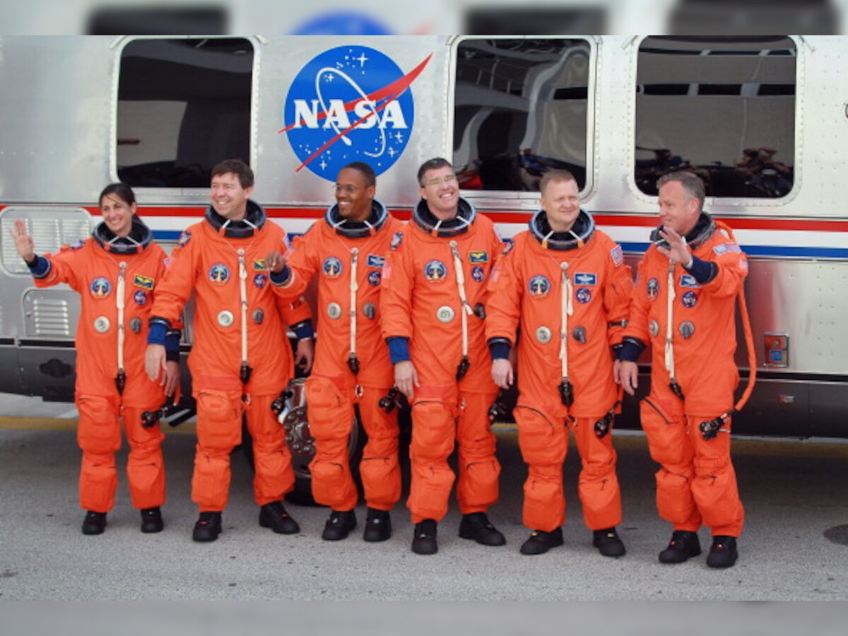 NASA astronauts prepare for flight on commercial spacecraft