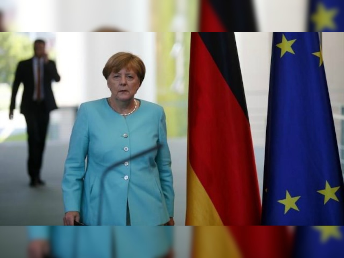 Brexit: Germany's Angela Merkel signals sober separation from EU 'partner' Britain