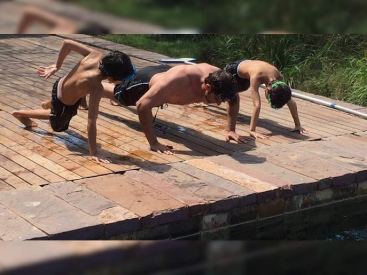 Chips of the old block: This pic of Hrithik Roshan doing push-ups with his sons is just awwww 