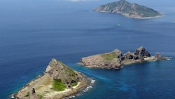 Japan summons Chinese envoy amid ship 'incursions'