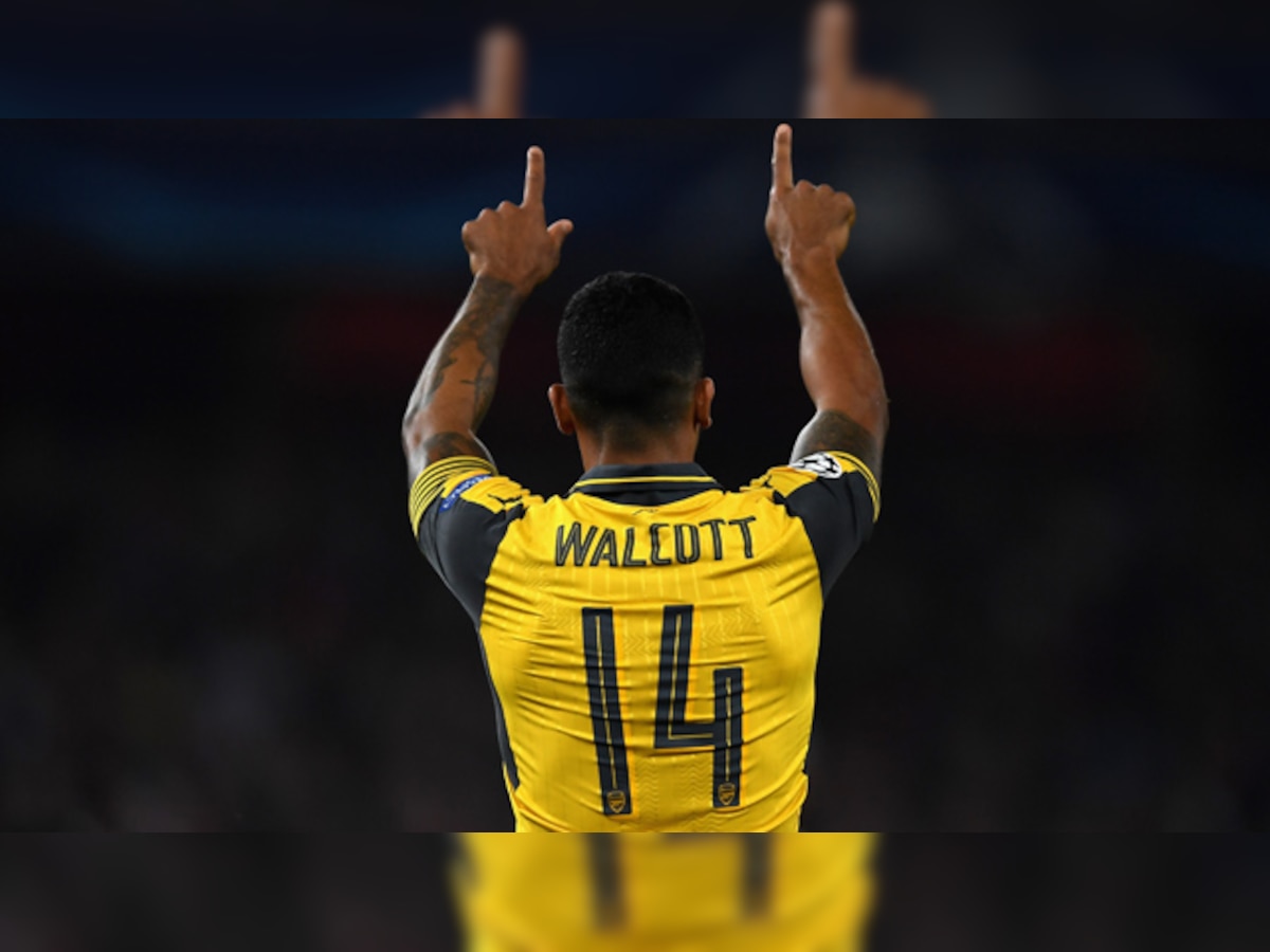 Theo Walcott's return to form helps Arsenal beat Basel in Champions