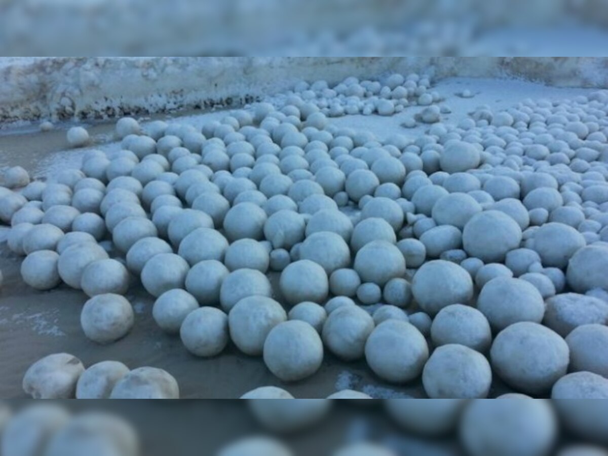 Thousands of mysterious giant snowballs appear on beach in Siberia