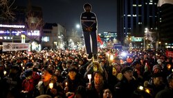 South Koreans march close to presidential Blue House demanding president resign