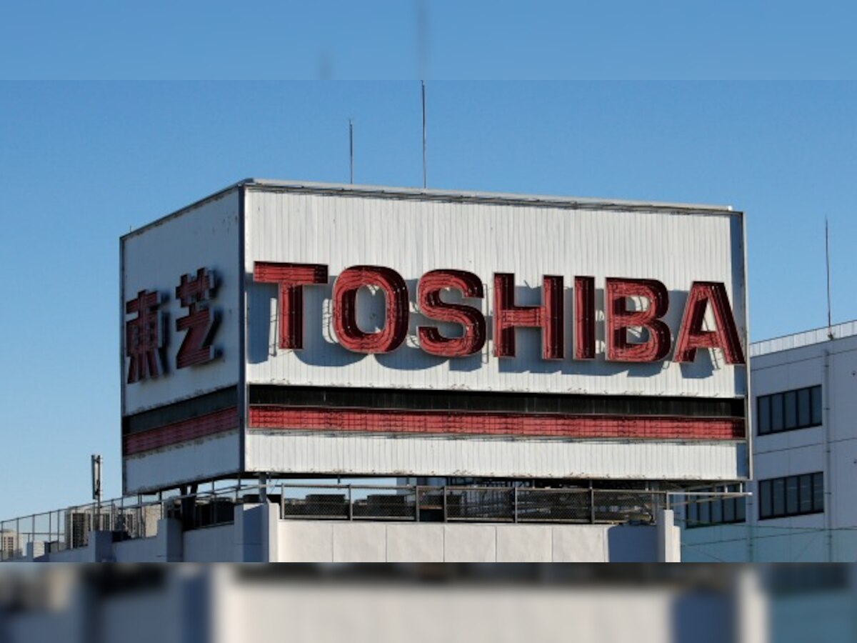 Why has Toshiba's stock lost 50% market value since late December?