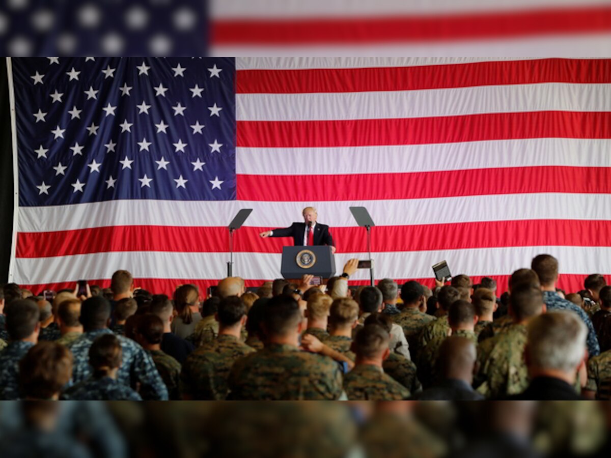 Trump ends nine-day overseas trip with a flourish as trouble looms at home