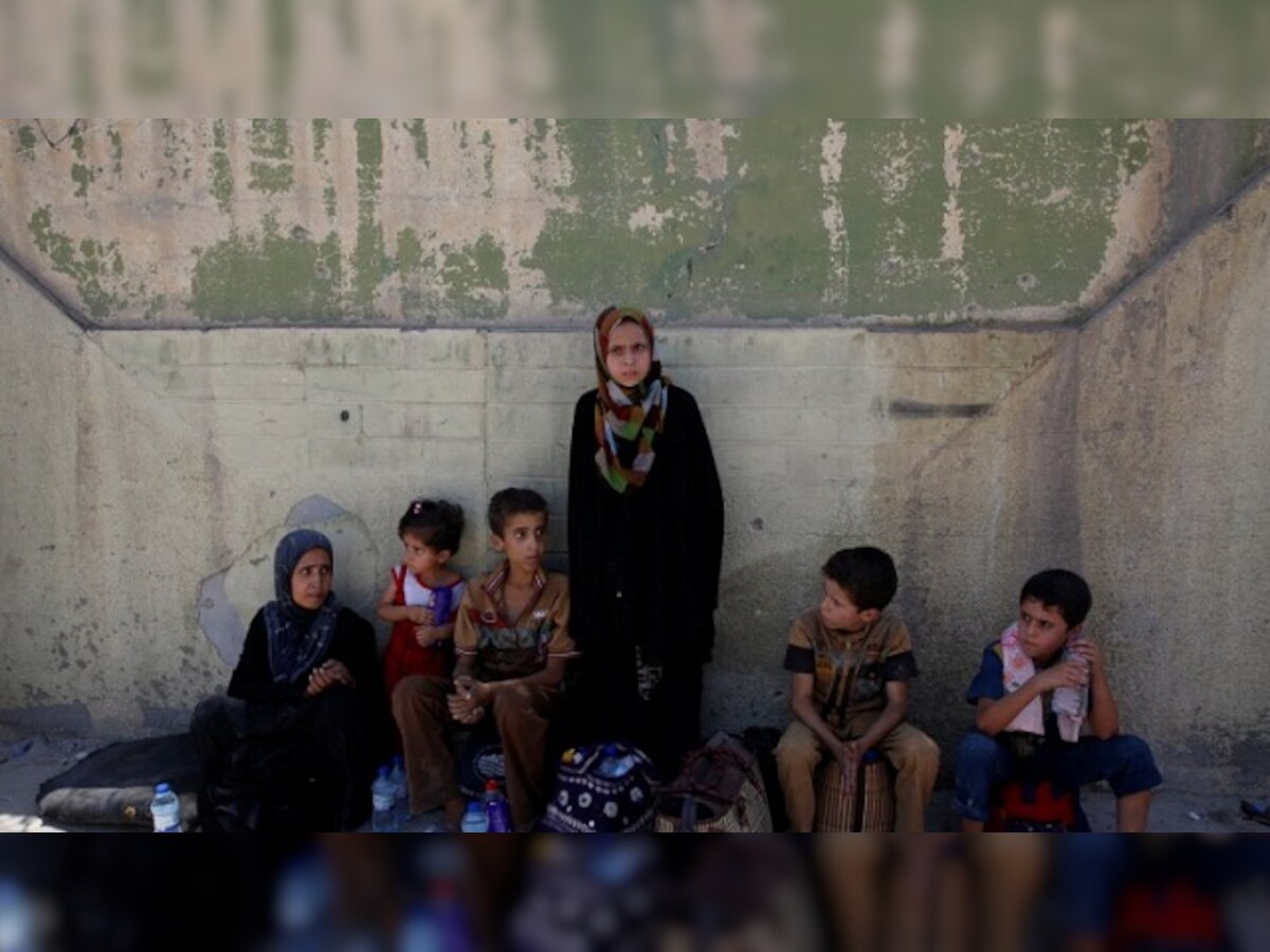 Civilians flee as Iraqi forces attack last Islamic State redoubt in Mosul