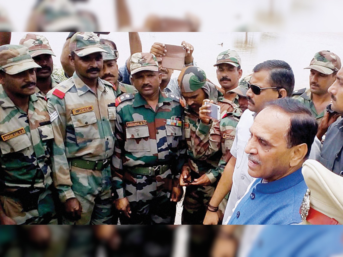 Amid criticism from Oppn, Gujarat govt hikes relief for flood victims