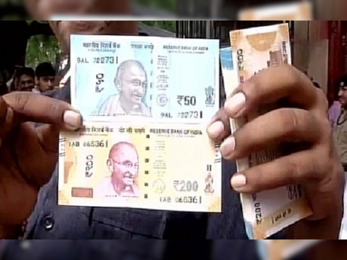 Rs 200, Rs 50 notes issued: People queue up to draw new banknotes from Reserve Bank of India 