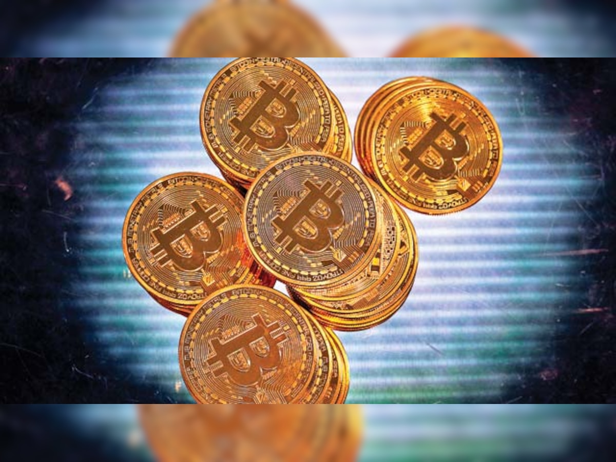 Centre mulls over implementation of bitcoins ; calls Infosys, Wipro  and other IT majors to discuss