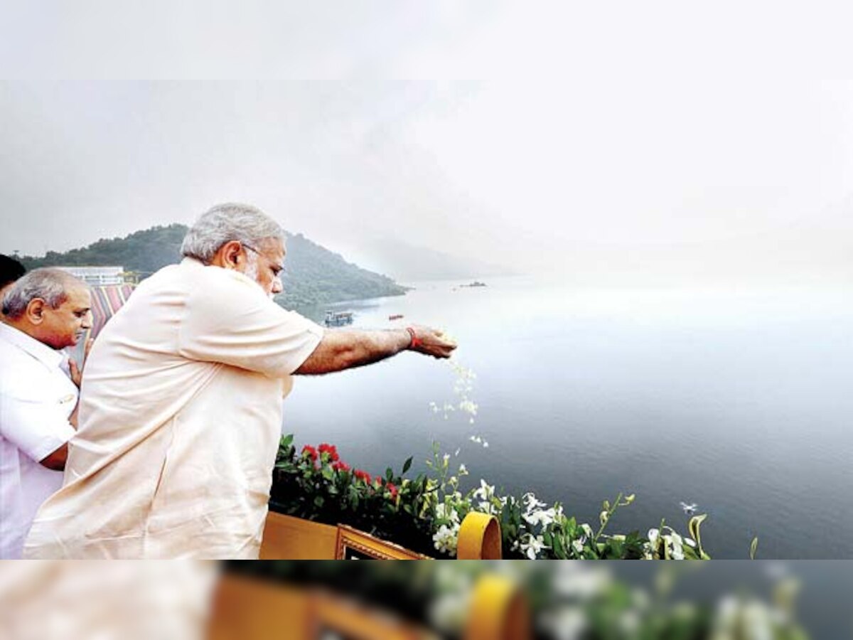 Modi opens Sardar Sarovar dam, vows balanced growth