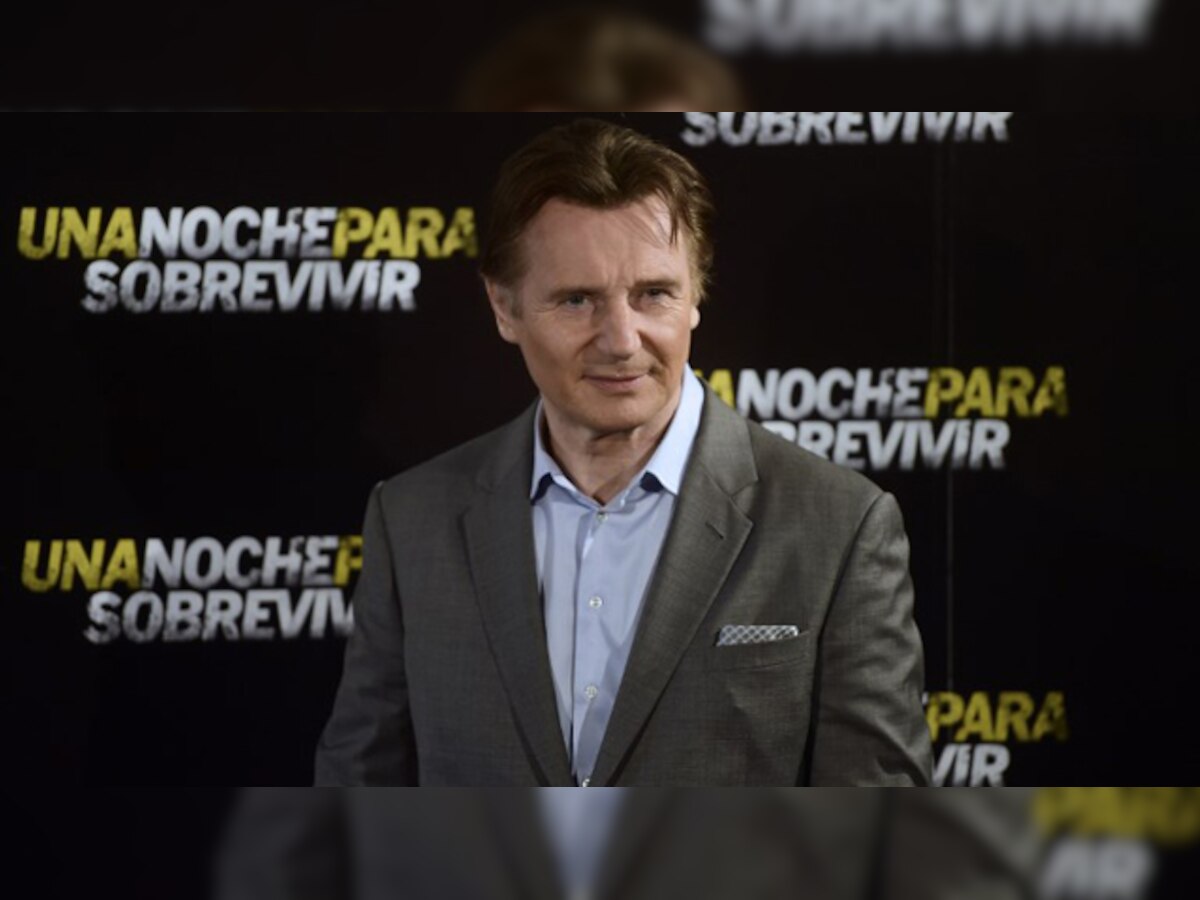 Liam Neeson will keep doing action movies 'until they bury him in the ground'