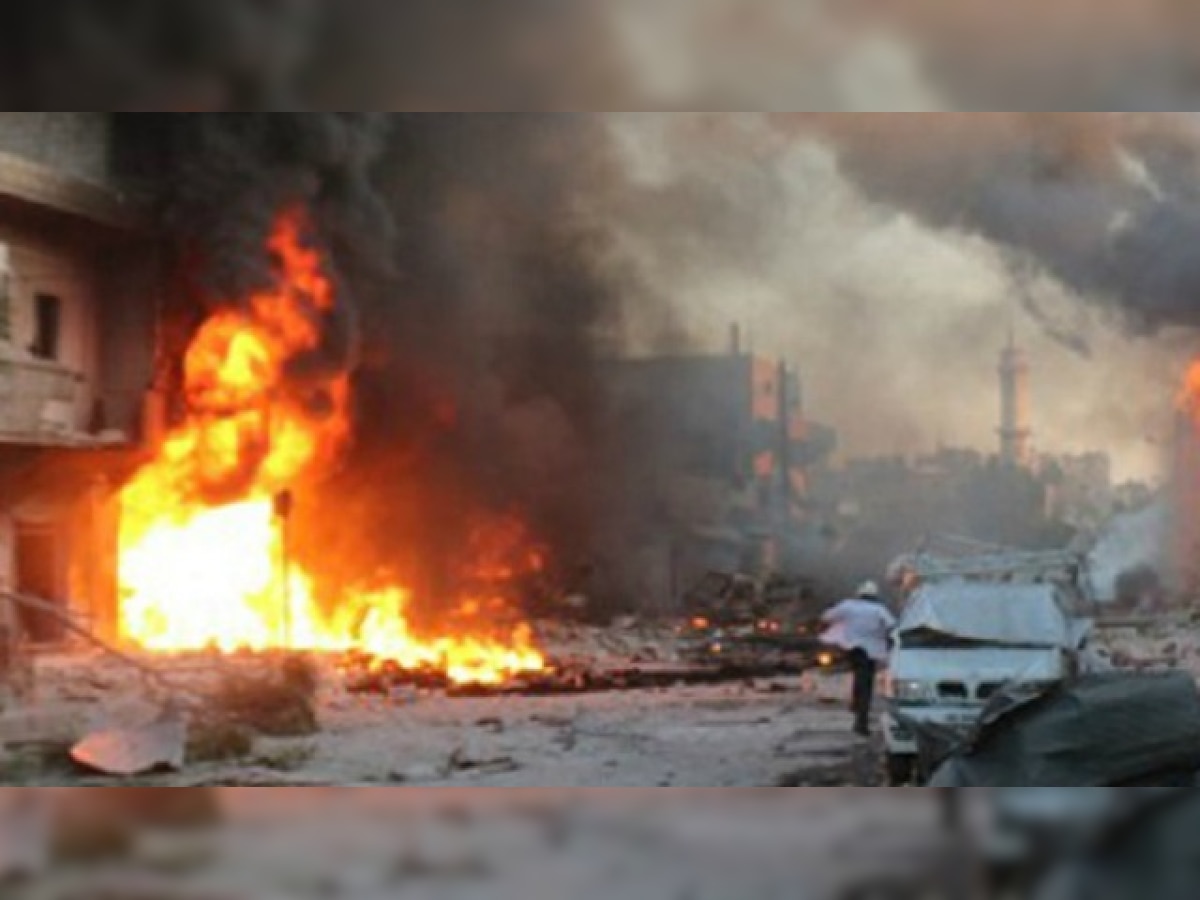 Twin car bombs kill more than 30 in Libya's Benghazi