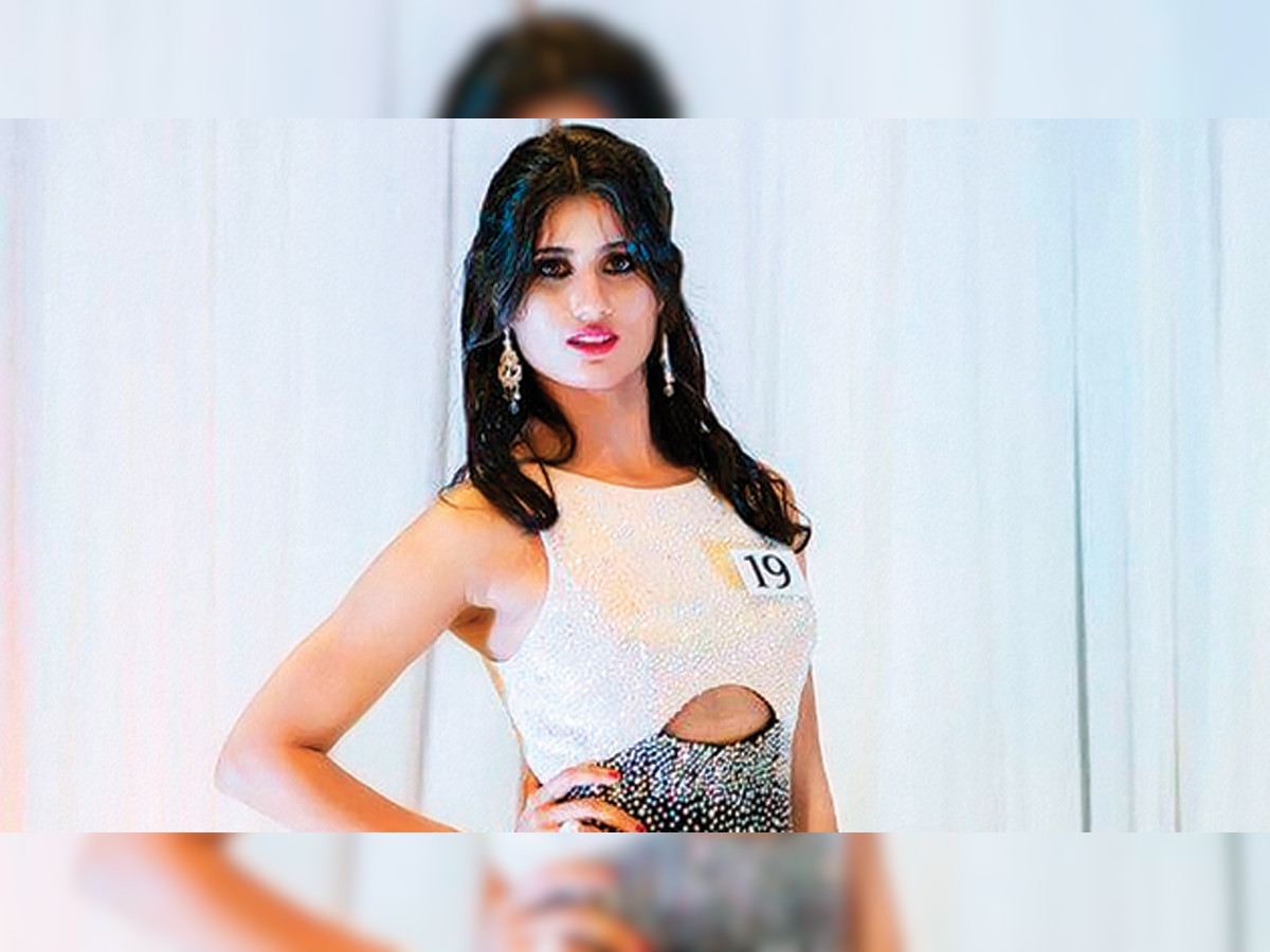 Stranded model gets passport in record time
