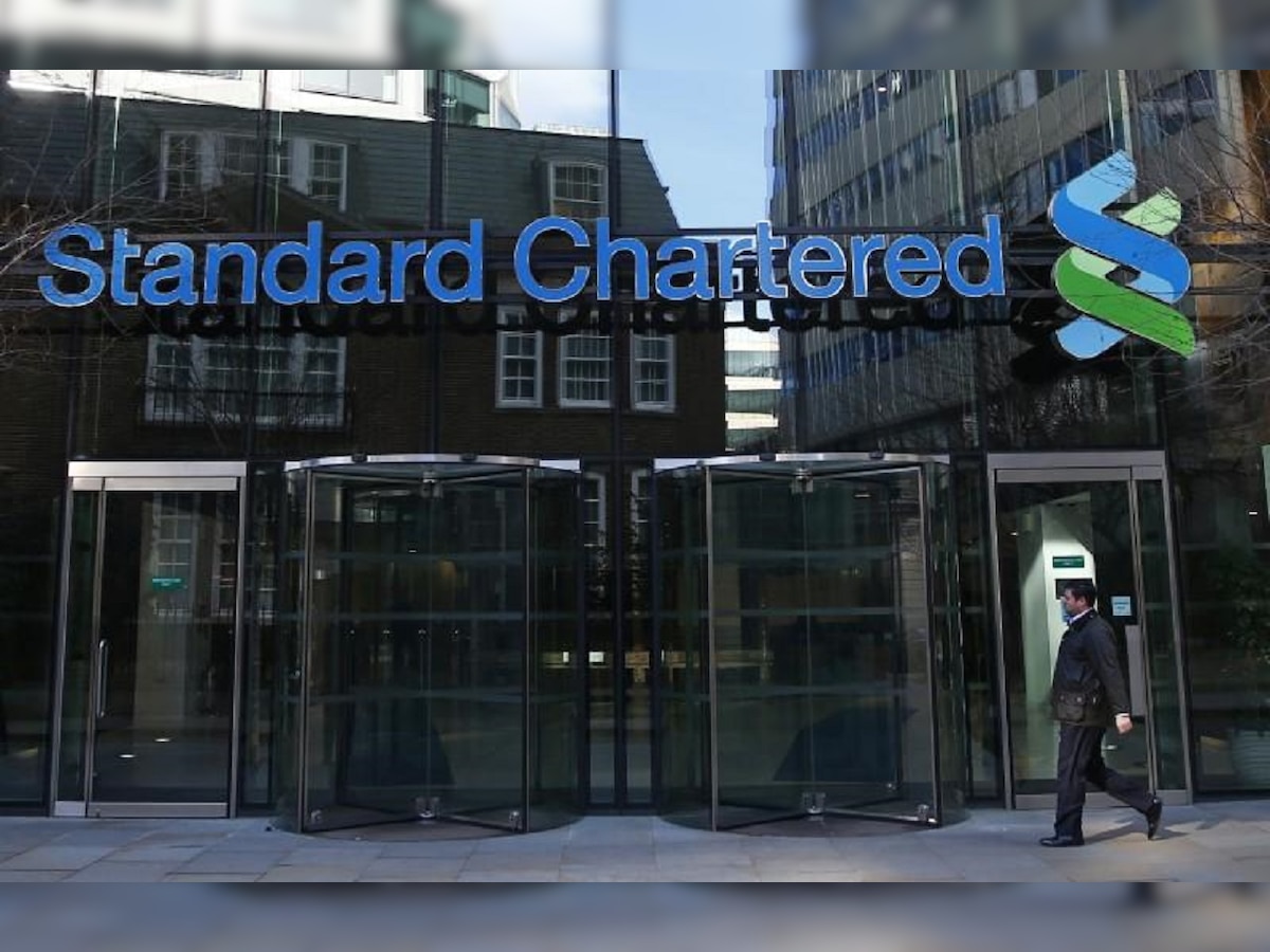 Standard Chartered brings back dividends as profits jump