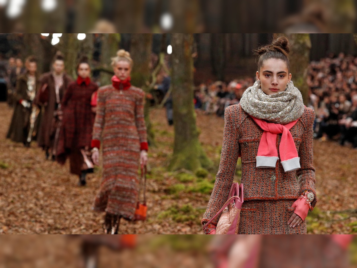 Karl Lagerfeld's models walk through wintry woods for Chanel Fall-Winter  collection