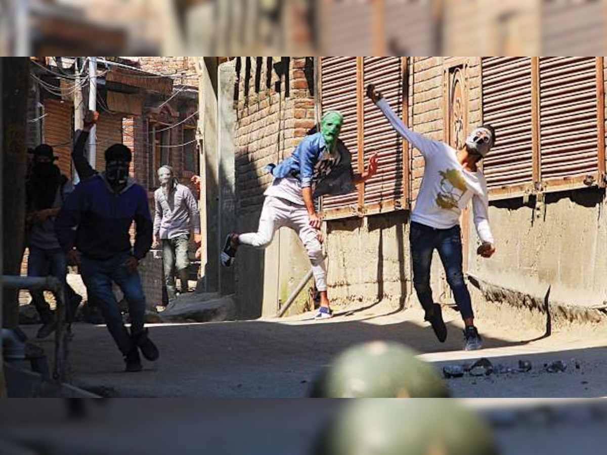 Violent clashes rock Kashmir Valley; students take to streets to protest against killings of militants, civilians