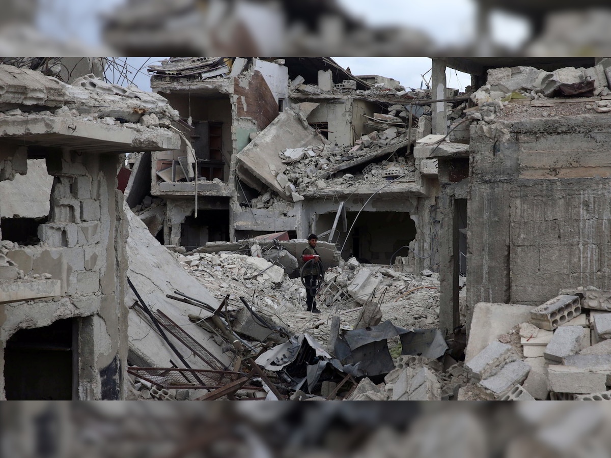 Gas attack reported on Syrian rebel enclave, Damascus denies charge