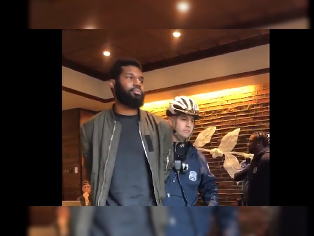Accused of racial profiling, Starbucks apologises for arrest of two black men in Philadelphia shop