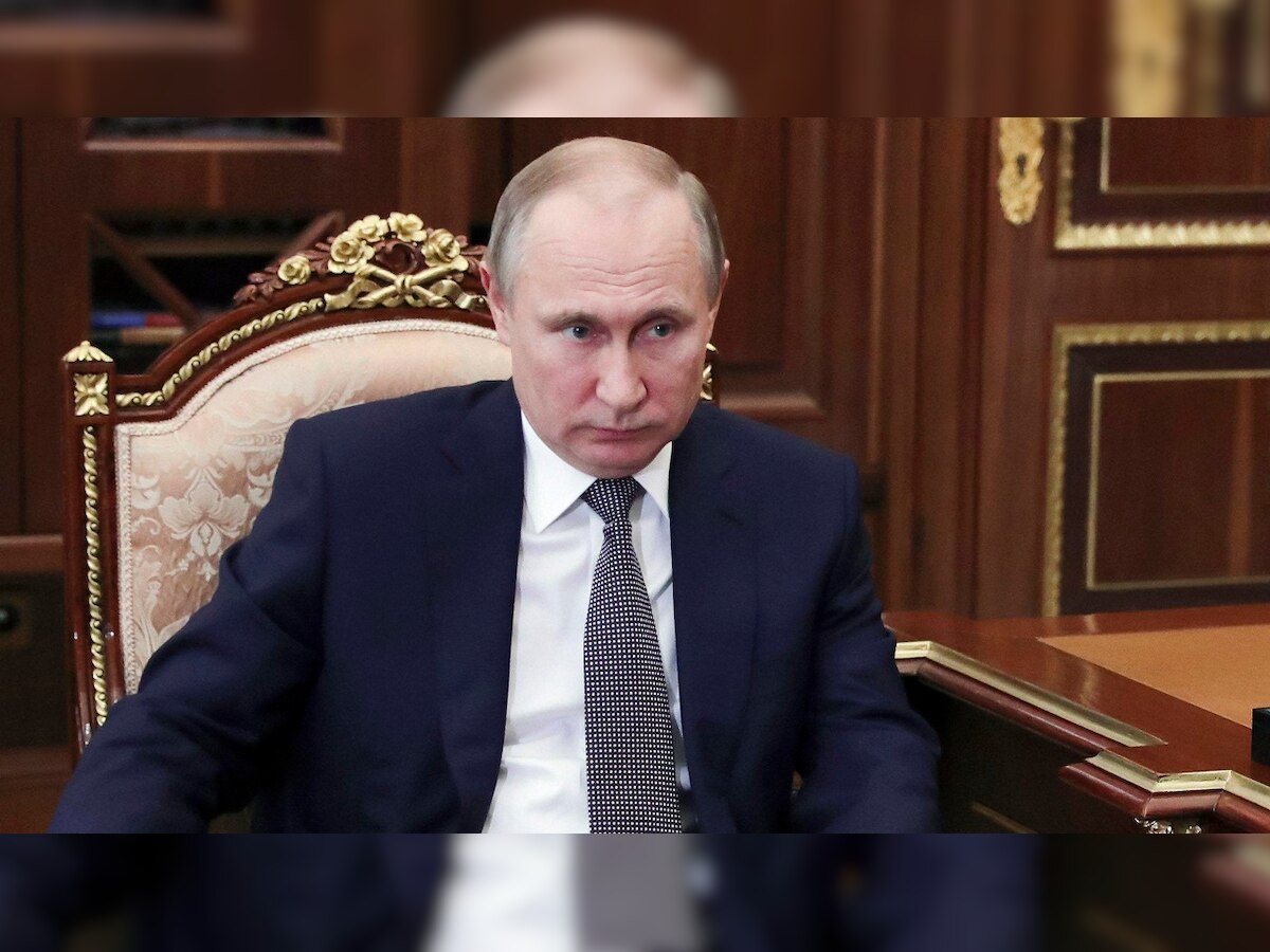 Putin warns of global 'chaos' if West hits Syria again as US set to announce new sanctions