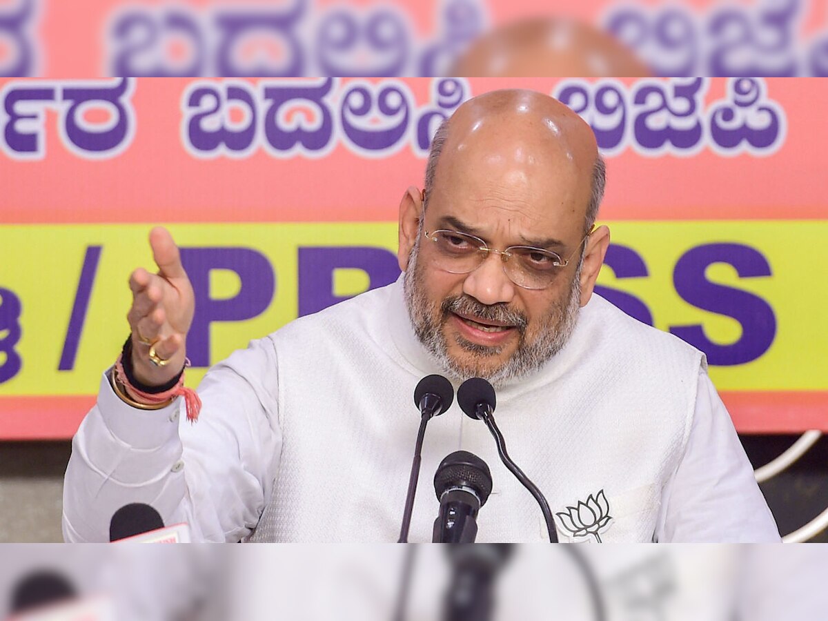 TDP activists protest against Amit Shah in Tirupati, pelt stones at his convoy