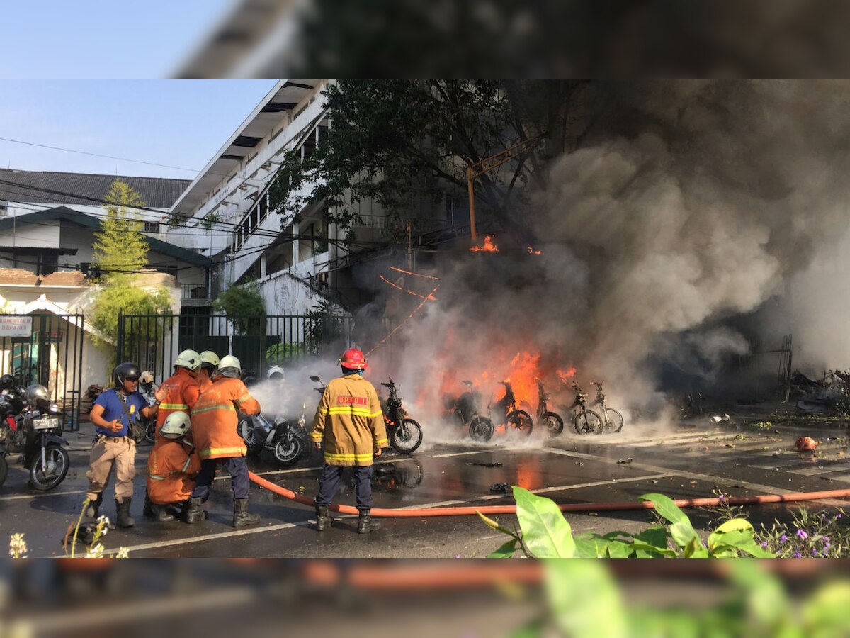 At least 11 dead, 40 injured as suspected IS-inspired suicide bombers attack Indonesian churches