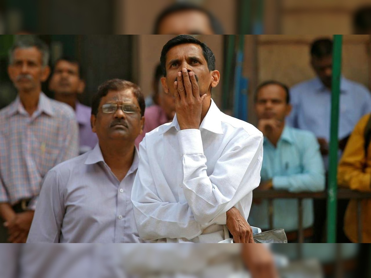 Sensex suffers more losses, falls 214 points over fresh trade war worries