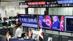 Dollar rises, stocks inch up as US-North Korea summit gets underway