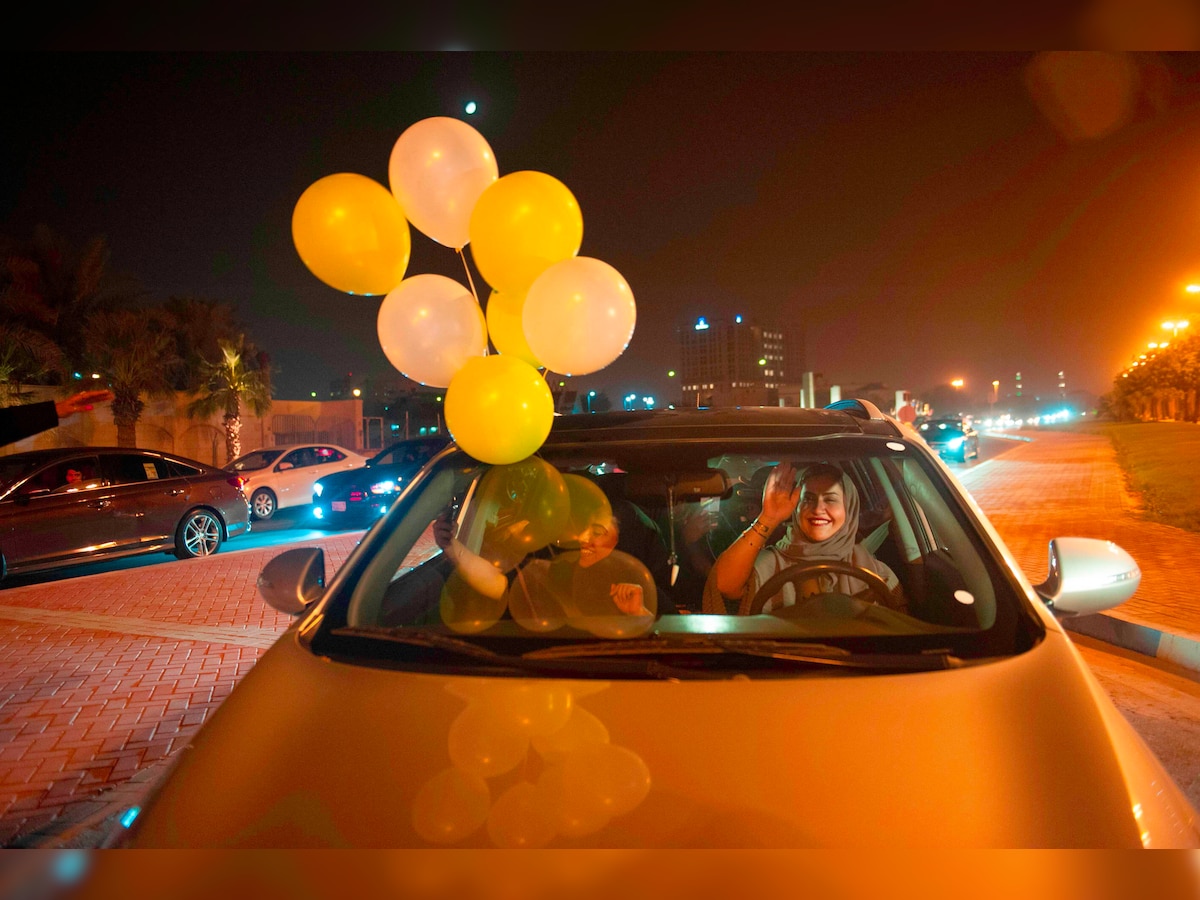 In Saudi Arabia, women step out at the stroke of midnight to finally drive a car