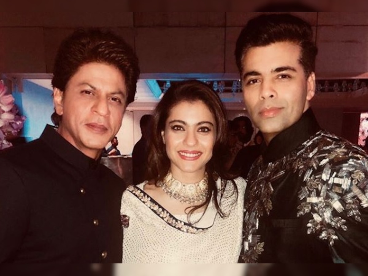 This picture of Shah Rukh Khan with Kajol and Karan Johar at Ambani bash SCREAMS for their reunion for a film soon!