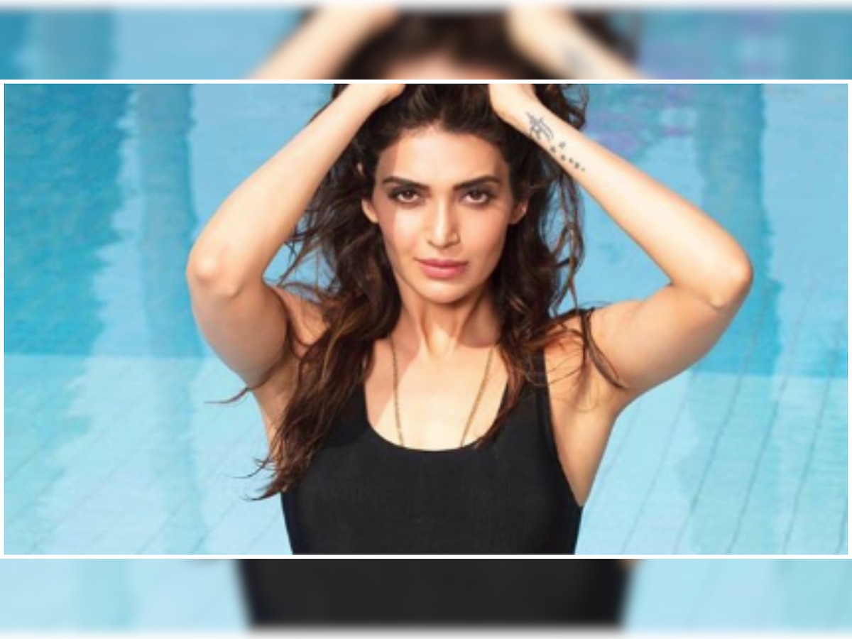 'Sanju' actress Karishma Tanna posts a hot bikini picture and we can't help but sing 'Mujhe Chaand Pe Le Chalo'