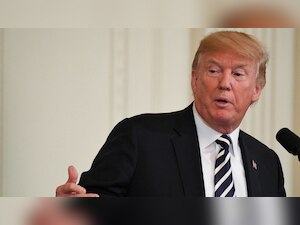 Trump says sanctions on Russia will remain