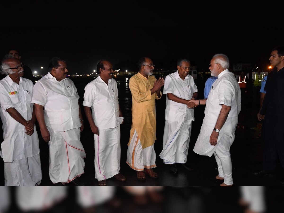 Kerala Floods: PM Modi reaches state, greeted by CM Vijayan at airport 