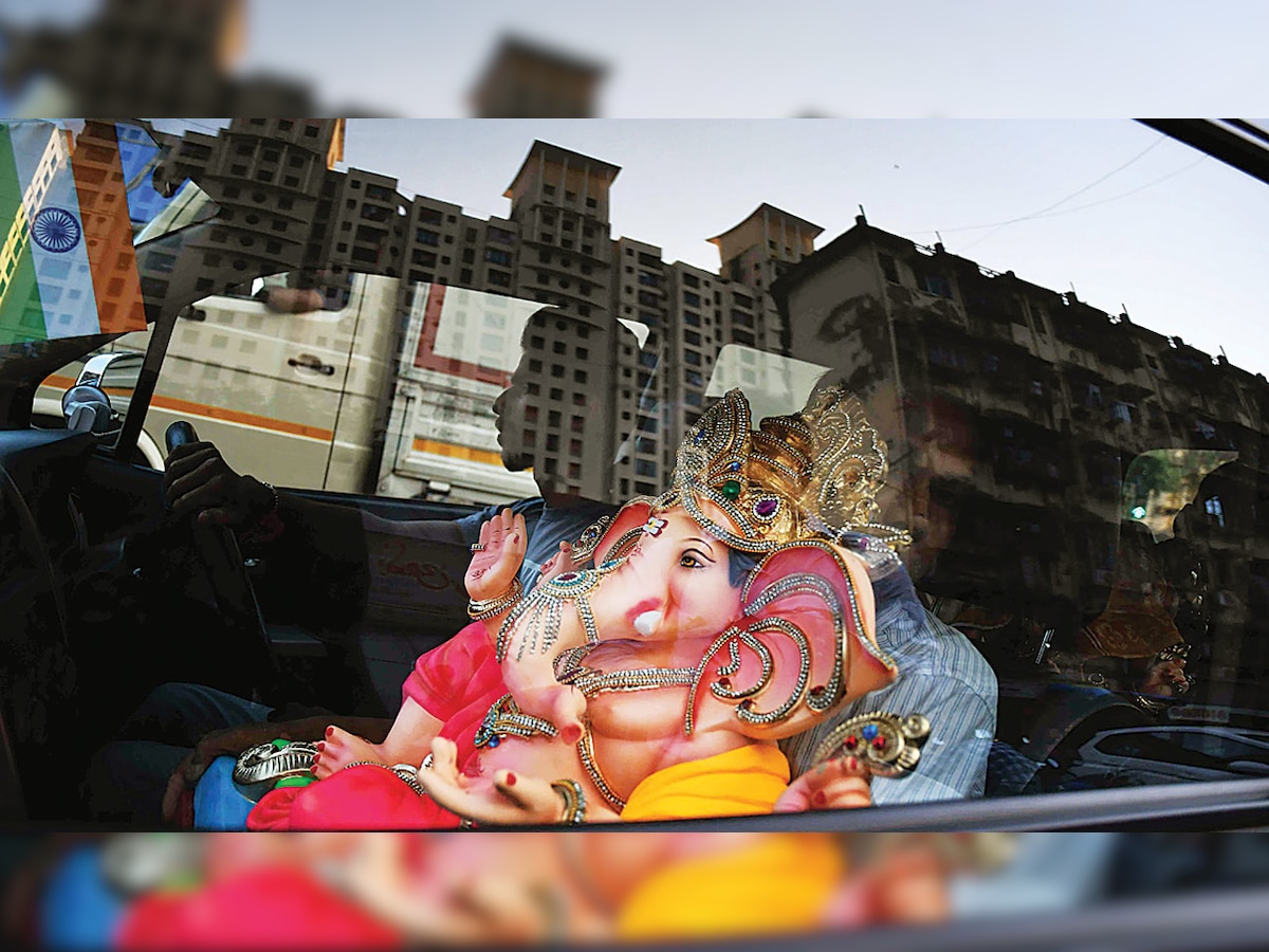 Mumbai: Even Bappa is not spared of potholes